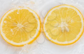 lemon in water on a white background