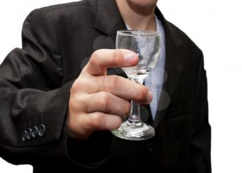 glass of champagne in his hand a businessman