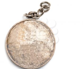 old medal on white background