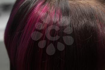 background of the hair with a pink streak