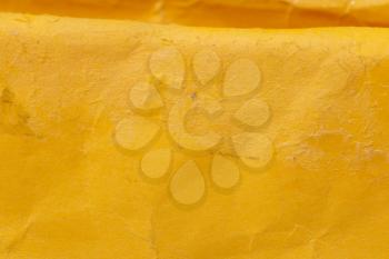 yellow crumpled paper as a background
