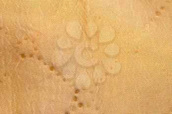 Background of golden fabric. texture