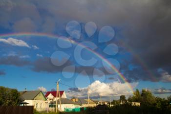 rainbow in the sky in the village