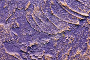 Abstract background of a purple plaster wall