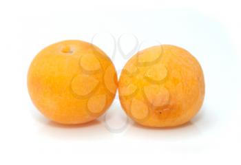 yellow plum on a white background