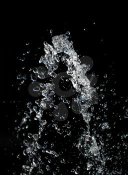 beautiful background with splashes of water on a black background