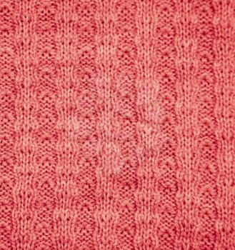 red knitted fabric as a background. macro