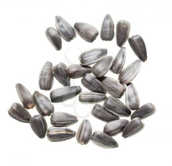Fried black seeds isolated on white background .