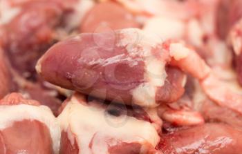 Chicken hearts for cooking as a background