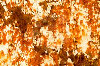 background of rusty metal painted with cracked paint .