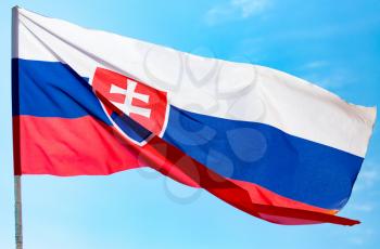 flag of Slovakia against the blue sky .