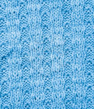 background of the blue knitted fabric. texture