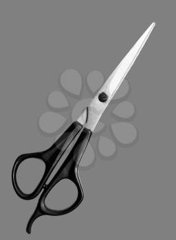 scissors on a gray background