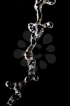 a jet of water on a black background