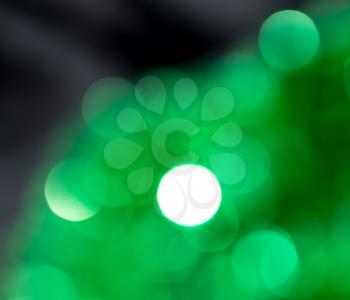 holiday background of green bokeh