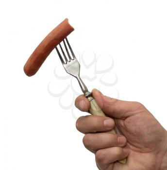 sausage on a fork in his hand on a white background
