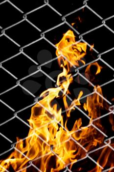 fire in a metal grid