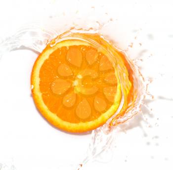 orange in water on white background