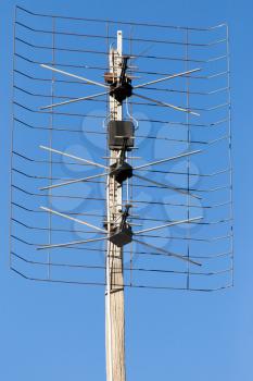 old antenna on a background of blue sky