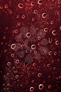 brown water drops on glass