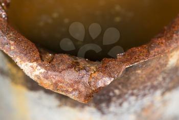 water in a rusty pipe