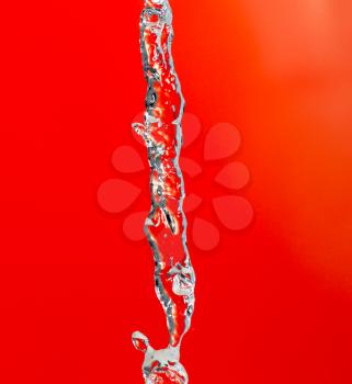 water jet on a red background