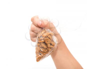 crackers in hand on white background