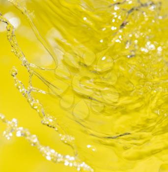 water on a yellow background