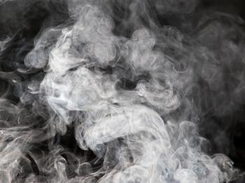 The abstract figure of the smoke on a black background