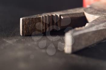 pliers on black. close-up