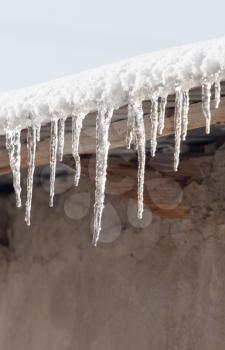 Icicles hanging from roof