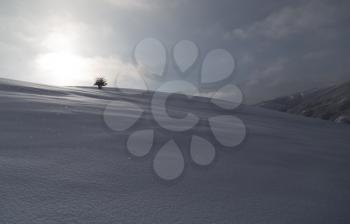 dawn sun in the snowy mountains