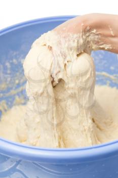 Making dough by female hands