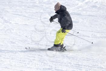 Athlete skiing in the snowy mountains