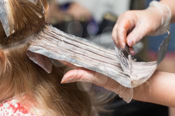 weave hair in a beauty salon