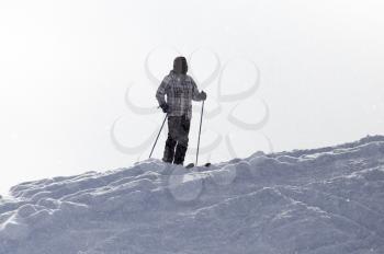 Athlete skiing in the snowy mountains