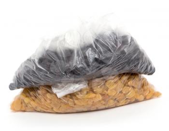 black and yellow raisins in a plastic bag