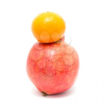 pomegranate and tangerine on a white background