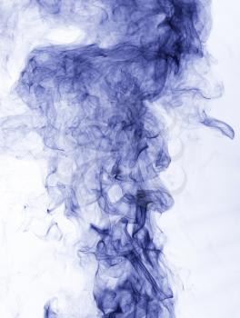 blue smoke on a white background. inversion