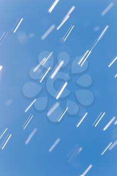rain drops on a background of blue sky