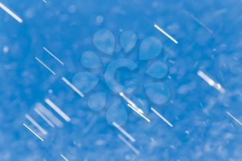 rain drops on a background of blue sky