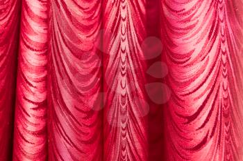 Red fabric as a background. texture