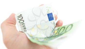 euro in his hand on a white background