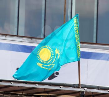 Kazakhstan flag on the roof of the house