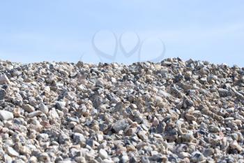 stones on nature on a background of blue sky