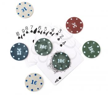 Casino chips and cards on a white background
