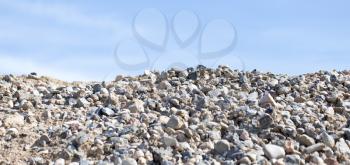 stones on nature on a background of blue sky