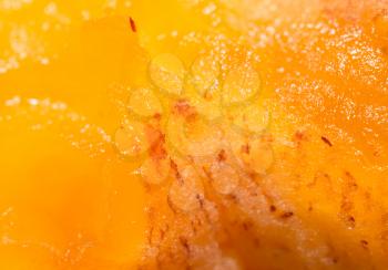 pulp ripe persimmons as a background. macro