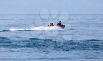 motor boat on the water at a speed of