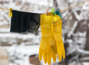 yellow gloves drying